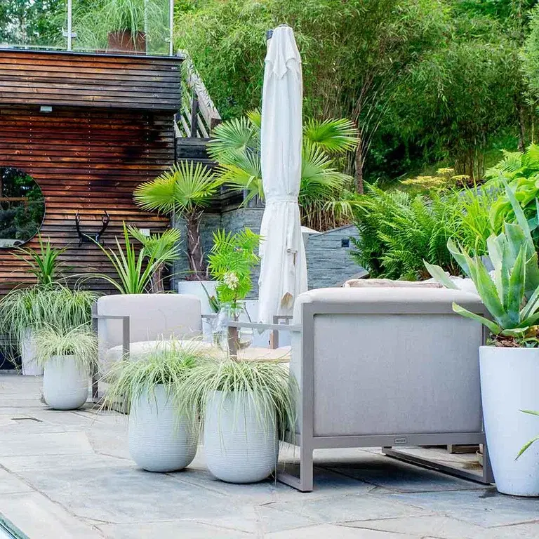 Decorate your outdoor space with garden furniture and plants